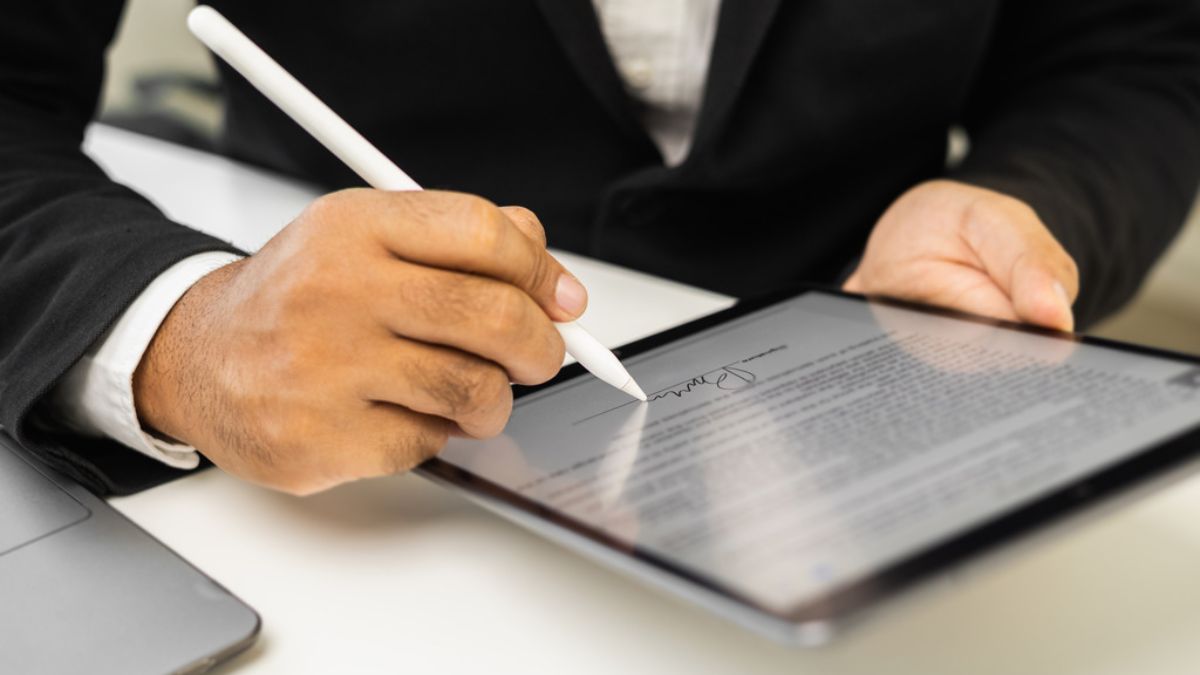 A man using smart contracts for deal agreements