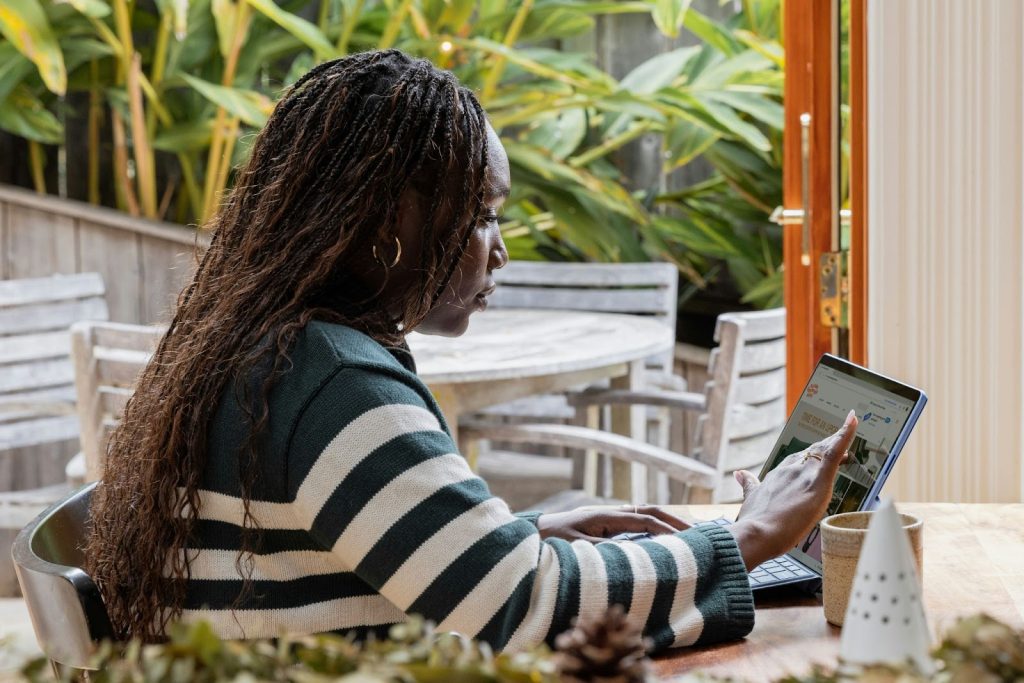 A woman with a digital nomad career working from home