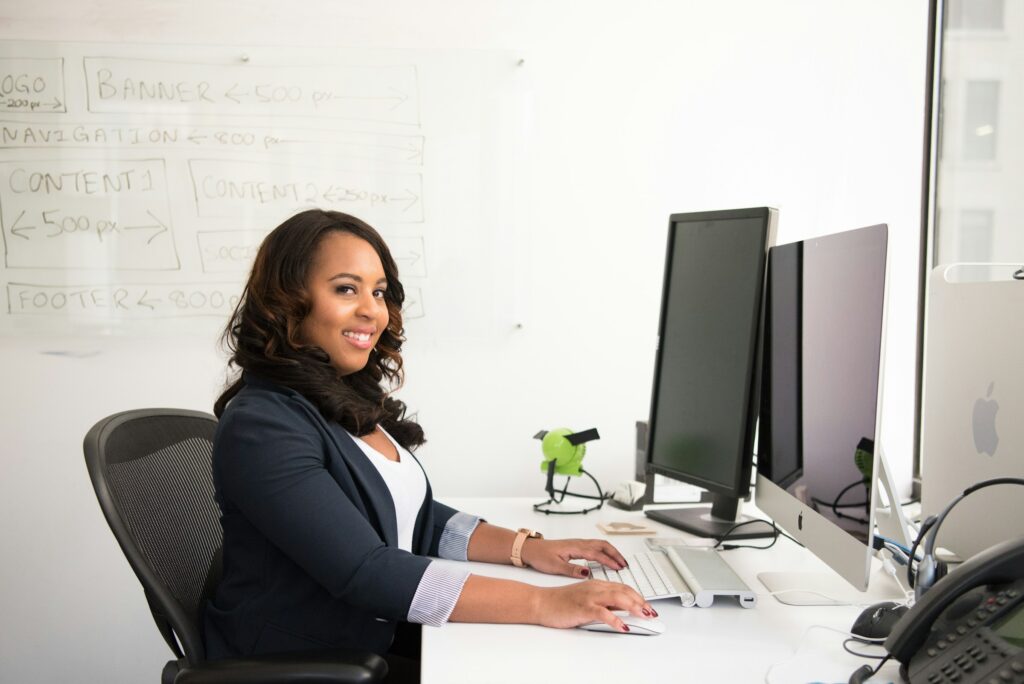 A woman working at the office  building passive income portfolio