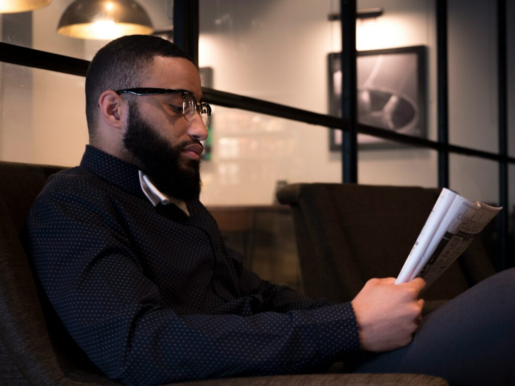 A business owner looking into a document on business loans for small business