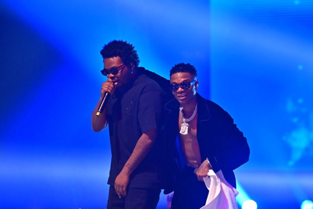Wizkid and Olamide performing afrobeat music on stage