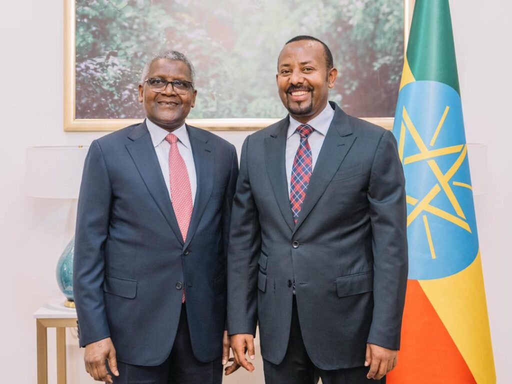 Aliko Dangote surrounded by entrepreneurial-minded people