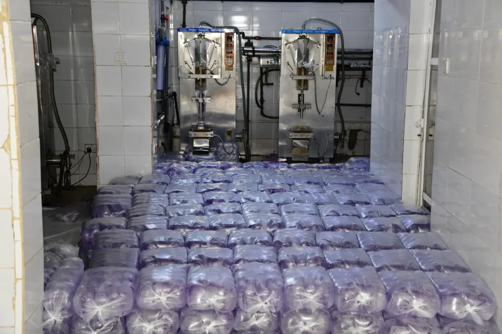 Pure water factory - production and packed bags of sachet water