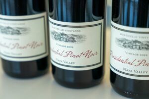 bottles of wine on a table - wine import business