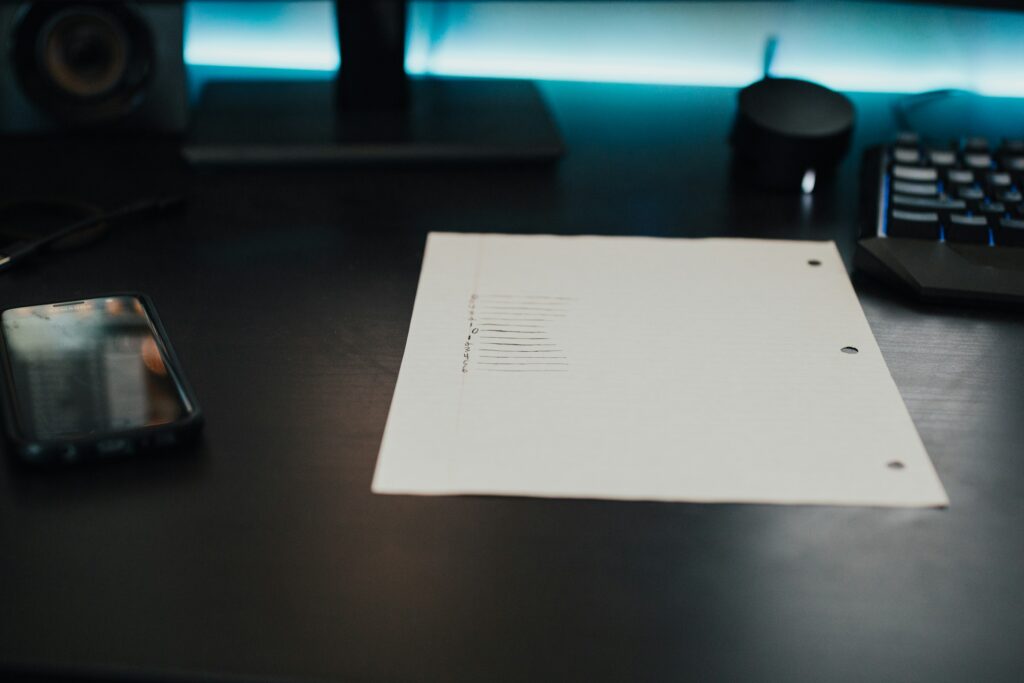 A printed paper on the table - Uber driver requirements in Nigeria